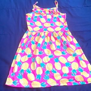 Girls dress in pink and yellow